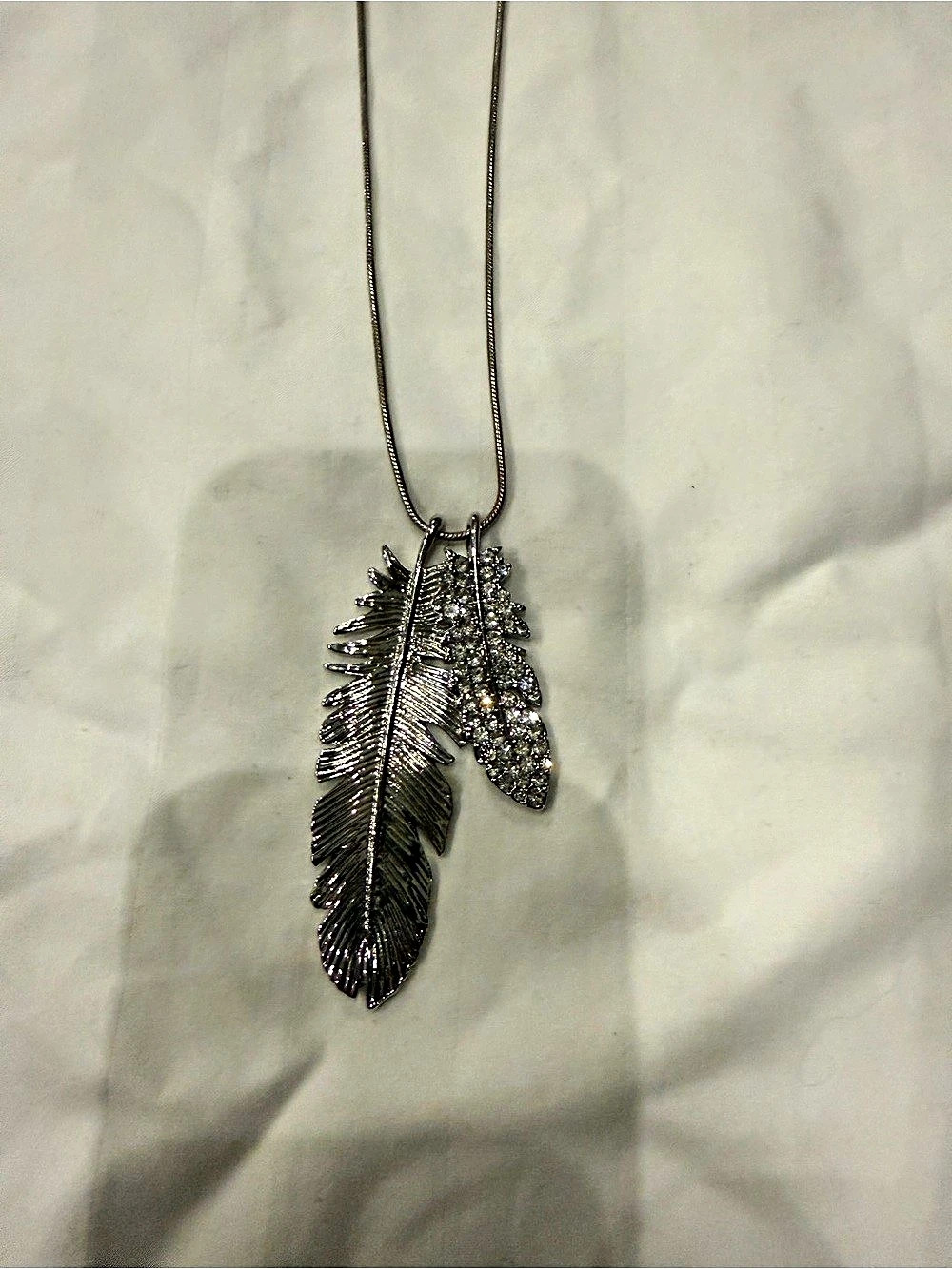 Feather Pendant Necklace in Silver Like New